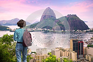 Woman walks along Rio de Janeiro