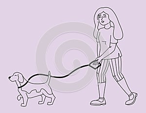 Woman walks her dog.