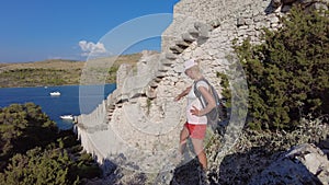 Woman on Wall of Ostrica of Croatia