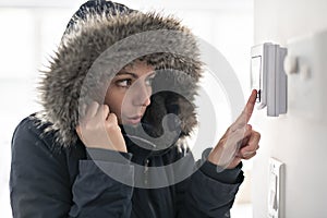 Woman With Warm Clothing Feeling The Cold Inside House