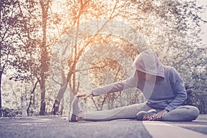 Woman warm up before running on the road for health concept