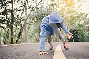 Woman warm up before running on the road for health concept