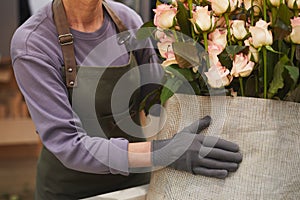 Woman warming roses