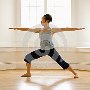 Woman in warrior pose photo