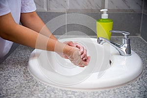 Woman wash hand with soap