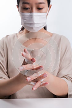 Woman wash hands on white background