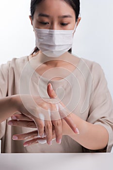 Woman wash hands on white background