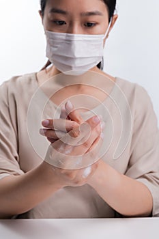 Woman wash hands on white background