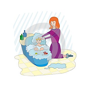 A woman washes and bathes her daughter in a baby`s bath. A lot of foam and toys