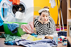 Woman washing clothes at home