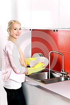 Woman washing dishes