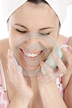 Woman washing face