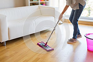 Woman washing floors, house keeping photo