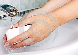 Woman washing hands