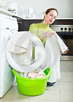 Woman with washing machine