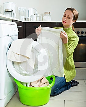 Woman with washing machine