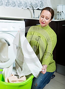 Woman with washing machine