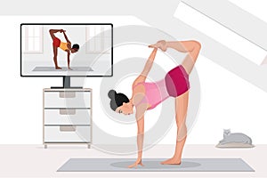 Woman watch and repeat yoga education, practicing stretching at home with instructor by video on TV on Internet online