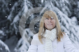 Woman watch the snow flakes