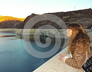 A Woman Watches a Sunset Over Lake Mead