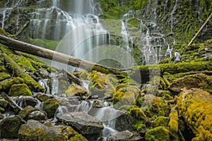 Woman Watches Water Flowing Down Proxy Falls