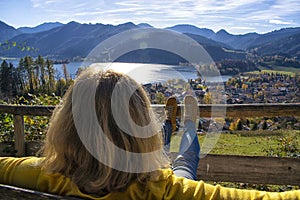 Woman watching at a beautiful mountain landscape