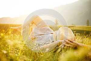 Woman watching the sunset. Serenity and relaxation.