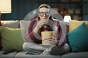 Woman watching a suspense movie
