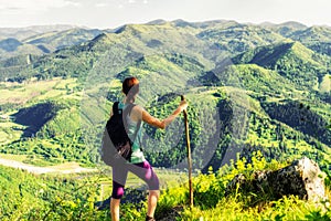 Woman watching from top of the hill, Slovakia