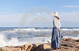 Woman watching waves