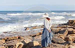 Woman watching waves