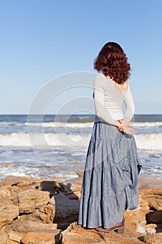 Woman watching waves