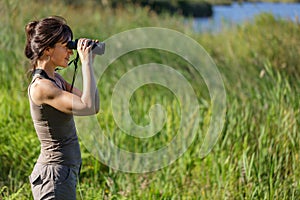 Woman watching wildlife