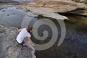 Woman on water background