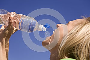 Woman and water bottle