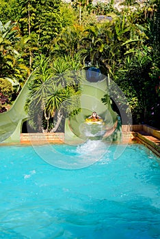 Woman in the water slides of a park or a resort