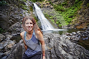 Woman and waterfall