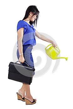 Woman and a watering can