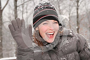 Woman waving goodbye