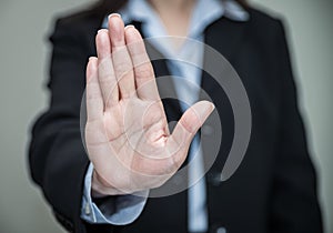 Woman waving hand and denying