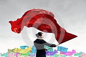 Woman waving red flag