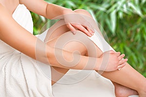 Woman Waxing Her Legs