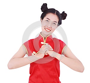 woman wear red cheongsam with gesture of congratulation in concept of happy chinese new year