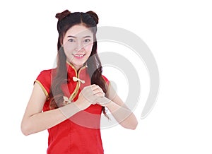 woman wear red cheongsam with gesture of congratulation in concept of happy chinese new year isolated on white background