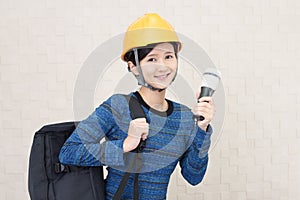 Woman wear a safety hat