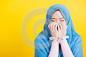 Woman wear veil hijab she sad crying using hand wiping tears in her eyes