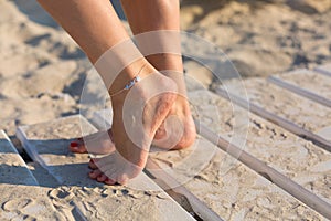 Woman wearing an anklet