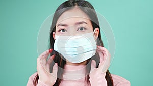 Woman wearing anti virus protection face mask