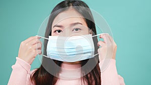 Woman wearing anti virus protection face mask