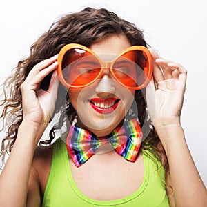 woman wearing big bright sunglasses